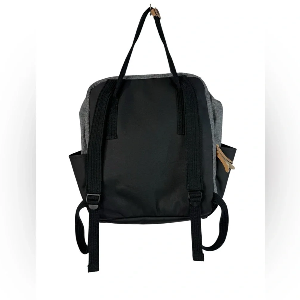Petunia Pickle Bottom gray & black backpack shoulder diaper bag.